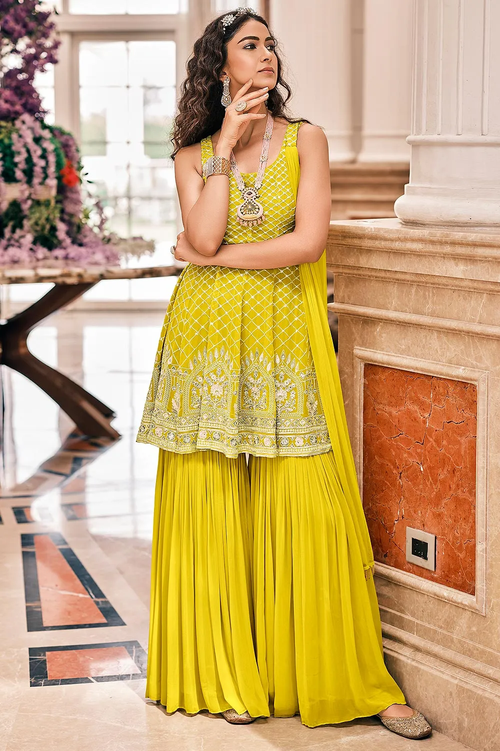 Peplum Style Haldi Yellow Viscose Palazzo Suit